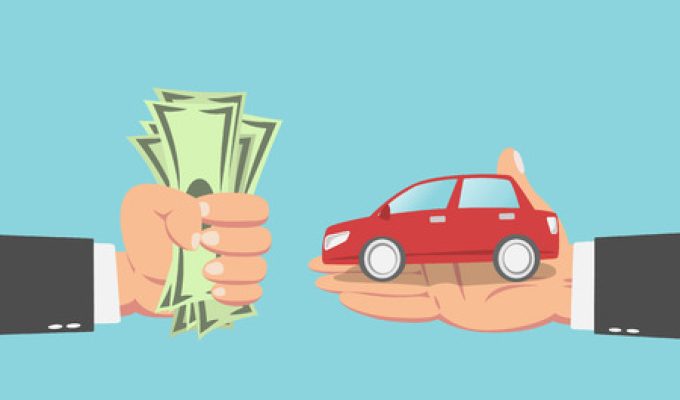 45934795 - hand of businessman with money buying a car isolated on blue background